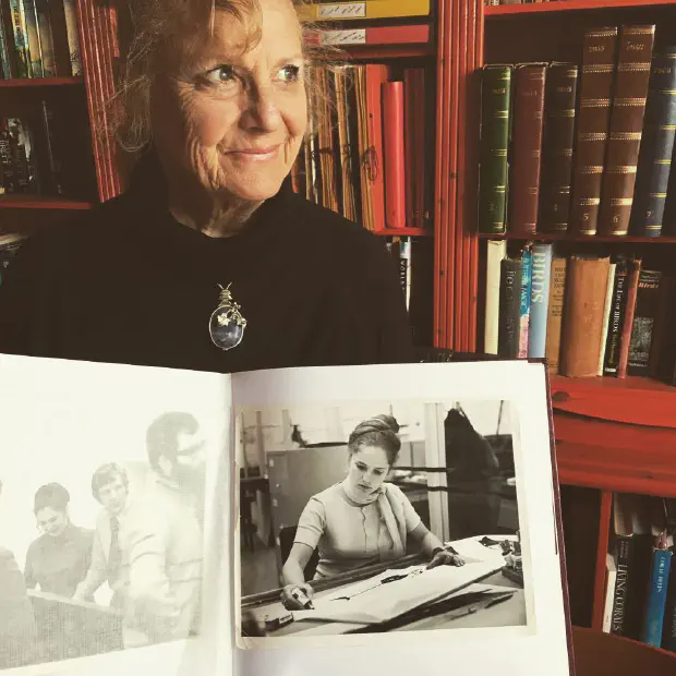 My mum officialy was 'made in daganum' well she designed car interiors Photo of Mary Louise Joan Harris holding a photo of herself working at Ford Motor Company designing interiors of cars