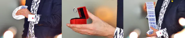 Magician juggling playing cards and floating wedding ring